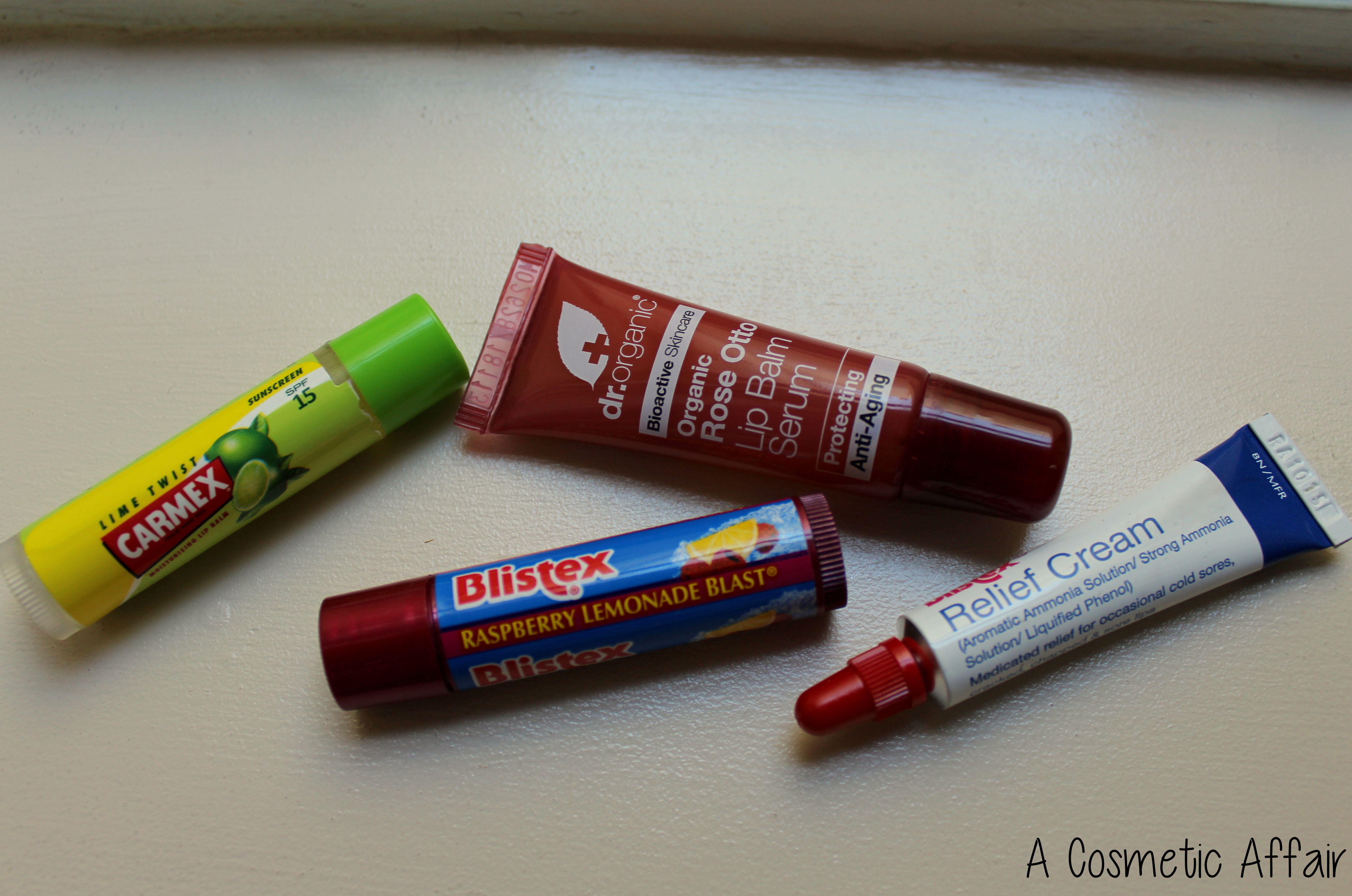 Carmex Blistex lip balm serum Dr Organic rose otto raspberrry lime relief